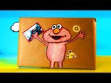 SURPRISE TOYS | Elmo Surprise Valentines Day Cards are found inside a surprise present!