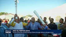 Rio Olympics: Syrian amputee carries olympic flame through Athens refugee camp