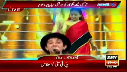 Turkish kid sing in Urdu