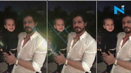 Shah Rukh Khan poses with Yusuf Pathan's cute son