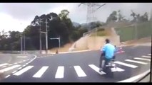 Scooter Rider Falls into Manhole in Taiwan