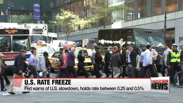 Federal Reserve holds rates steady citing need to monitor global economy