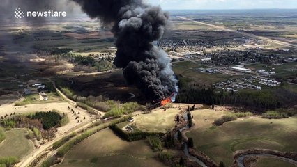 Fire tears through rail trestle bridge in Canada