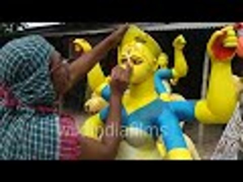 How Indian Potter Making Painting On Idol Of Goddess jagadhatri Roadside : wildindiafilms