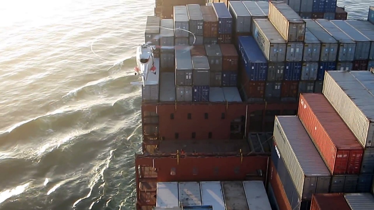 Pilot disembarking by helicopter