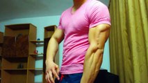 Hot Fighter Raul flexing his aesthetic muscles in a pink t shirt