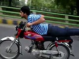 One Wheeling On Canal Road Lahore