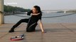 Martial artist squeezes whole body through tennis racket