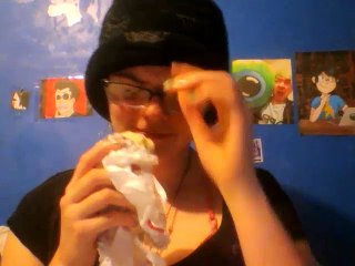 Eating a burrito while trying to look like a guy