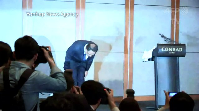 Intoxications en Corée du Sud: le dirigeant giflé et hué