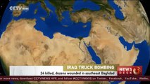 24 killed, dozens wounded in a truck bomb in Baghdad