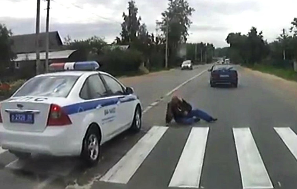 Cop Hits a Pedestrian Using The Crosswalk