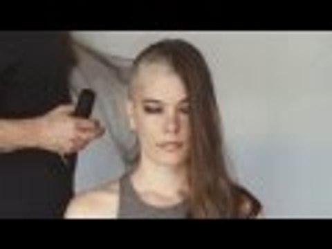 Brunette shaves her head bald