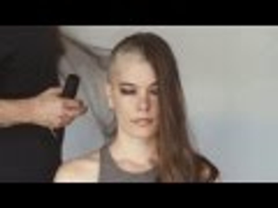 Brunette shaves her head bald