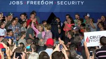 Carly Fiorina falls off stage, Ted Cruz keeps shaking hands