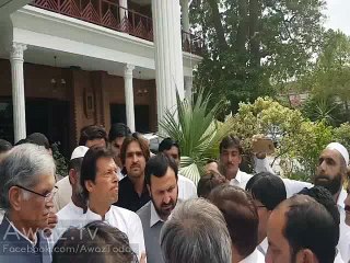 Imran Khan interacting with common people and listening to their complaints