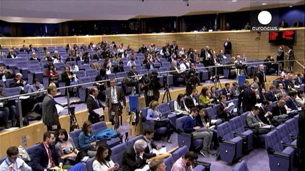EU executive cuts growth forecast for eurozone