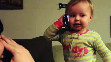 Baby Talks to Dad on Phone