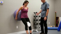 Wall Squats with Big Ball - Insync Physiotherapy Burnaby Heights