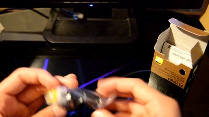 Unboxing: Camera gear: UV filter, Lens cap & EN-EL14