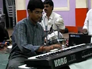 Poove Sempoove on keyboard by Sathya