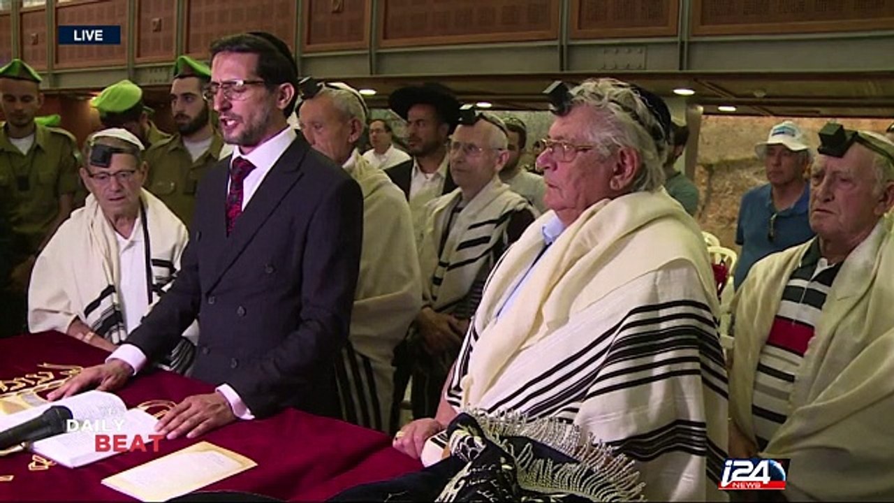 50 Holocaust survivors celebrate late Bar-Mitzvah at Western Wall