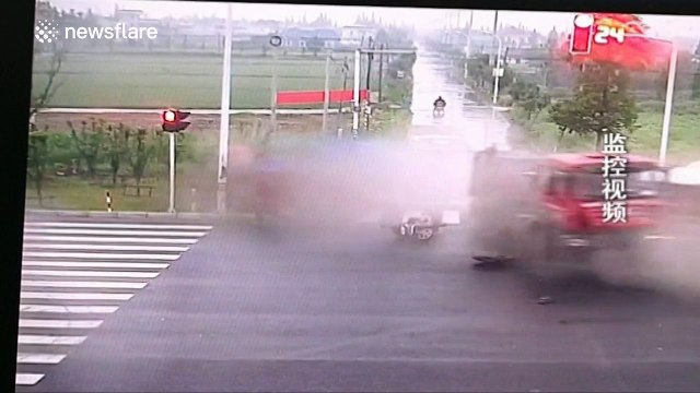 Lucky driver escapes being crushed by lorry