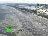 Japan Earthquake- Helicopter aerial view video of giant tsunami waves