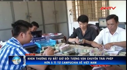 Bắt 2 “cửu vạn” cõng hơn 5 tỷ tiền giả về Việt Nam