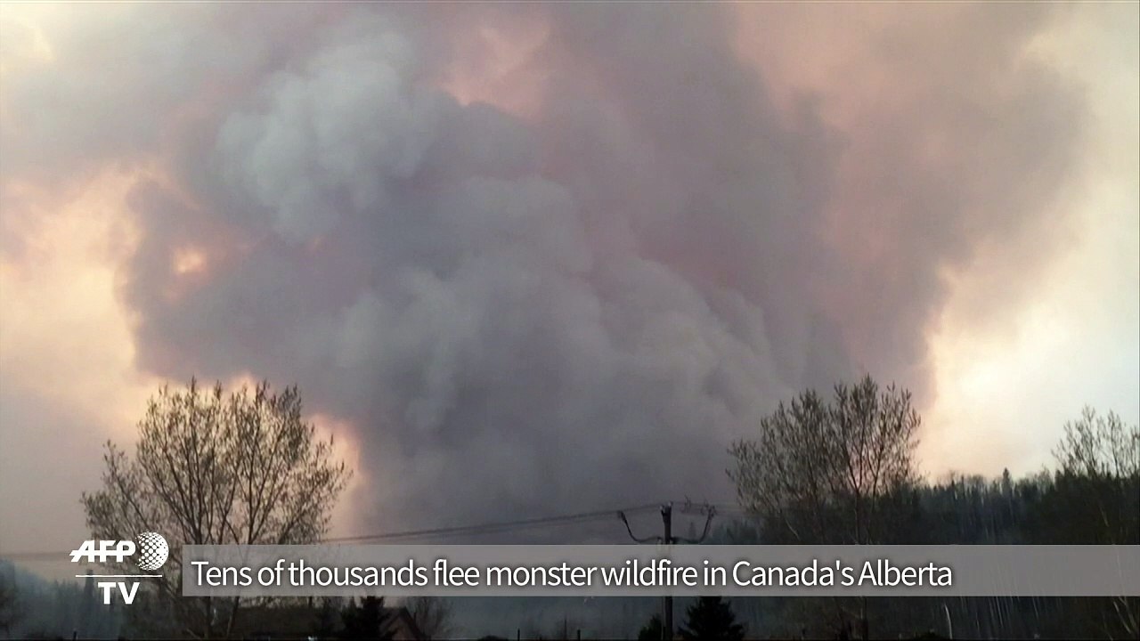 Tens of thousands flee wildfire in Canada's oil sands region