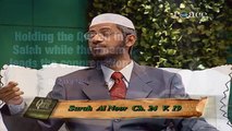 HOLDING THE QURAN IN SALAH WHILE THE IMAM LEADS THE CONGREGATION - BY DR ZAKIR NAIK