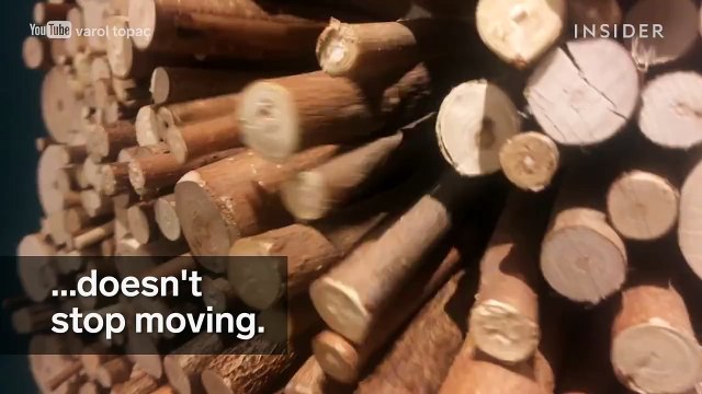 This wall sized sculpture never stops stop moving