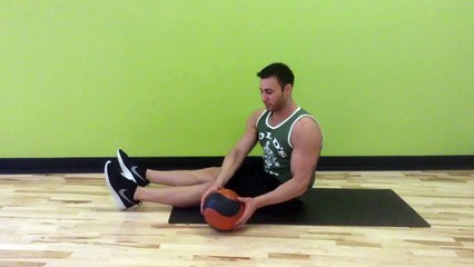 Medicine Ball Lying Torso Twist - Male Fitness Training - FxFitness.ca