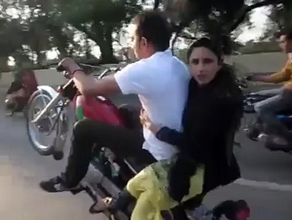 Pakistani bike wheeling with her girlfriend on road - desi girls video