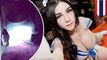 Thai model lights up her breasts to show fans how to spot the fake ones