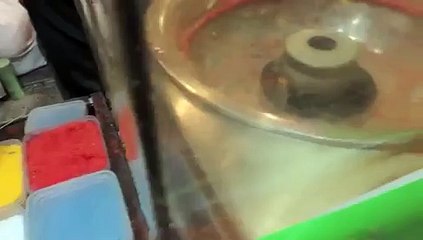 Barbe à papa en forme de canard jaune