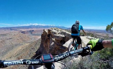 Fearless Mountian Bike Riders On The Edge Of A 400 Foot Cliff