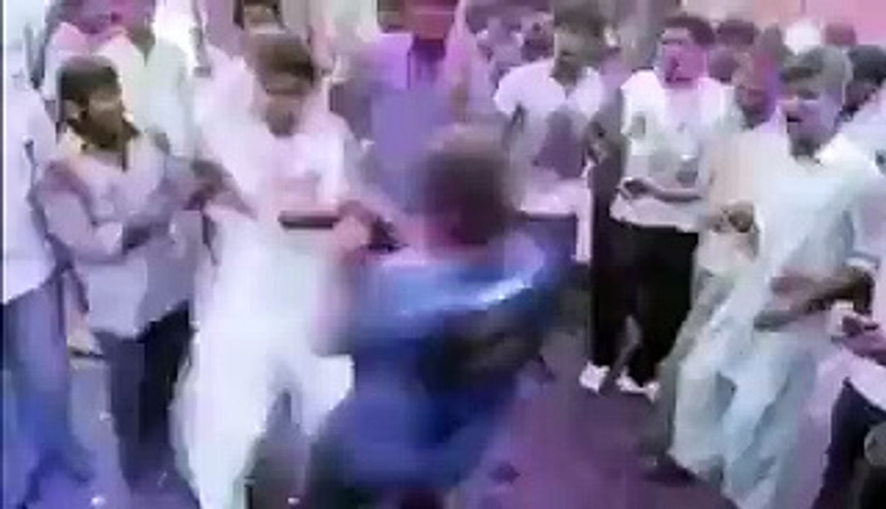 Girls and Boys celebrating Holi in University in Karachi