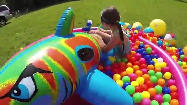 SURPRISE EGGS HUNT IN A KIDDIE POOL + Giant Egg Opening Golden Surprise Egg Ball Pit Frozen Elsa