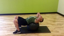 How To Do The Exercise Ball Crunch - Male Fitness Training - FxFitness.ca