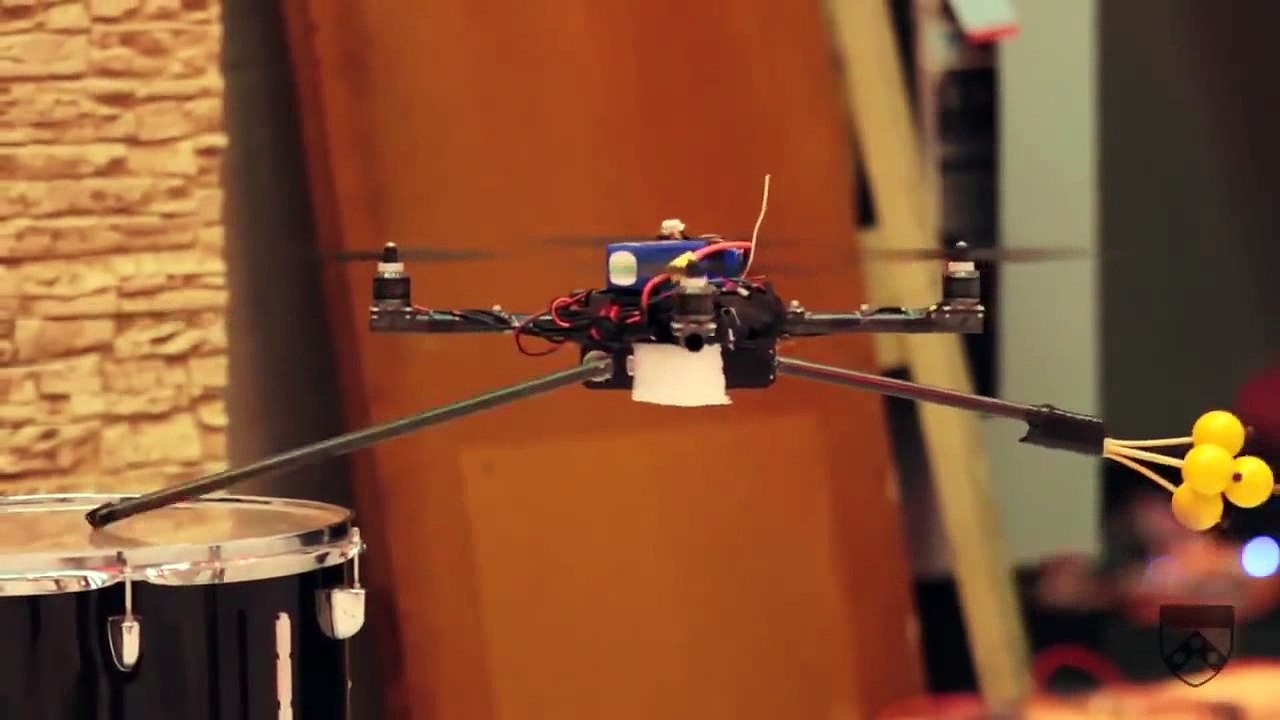 Science as Art! The musical theme of James Bond in the performance of small quadrocopters