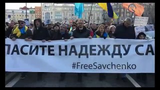 Во время шествия памяти Немцова россияне спели гимн Украины
