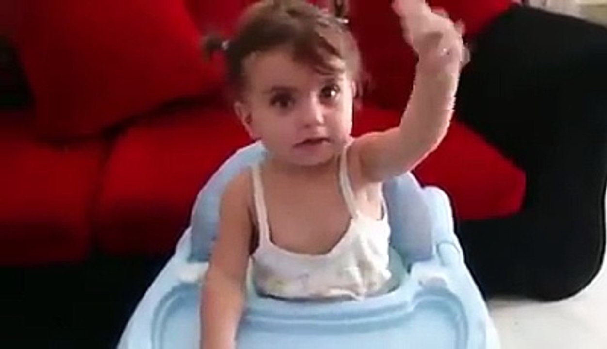 she stops crying when his father recites Quran