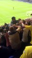 Leeds United fan crowd surfs on a surf board v Preston North End Football Club