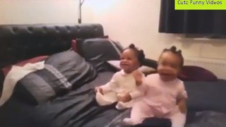 Twin babies enjoying thier mom's music