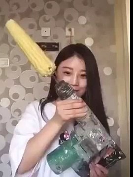 Woman gets hair pulled off when challenging rotating corn