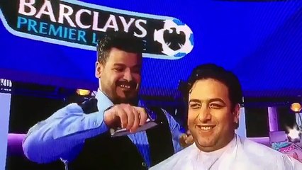 Ahmed Mido cut's his hair