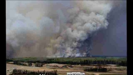 Bomberos esperan que la lluvia les ayude a controlar incendio en Canadá