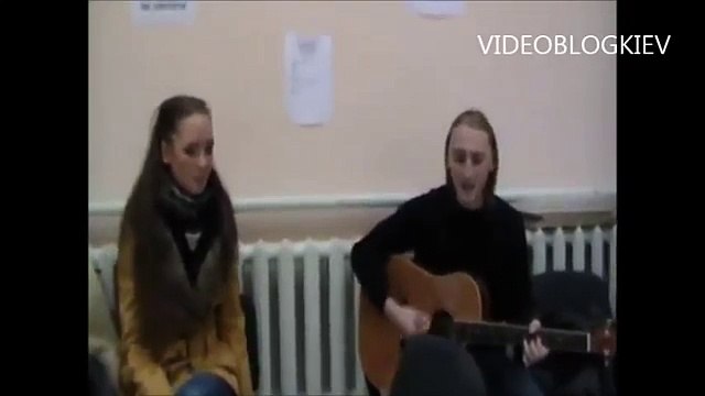 Boy and girl singing Ти не один, ти разом зі мною