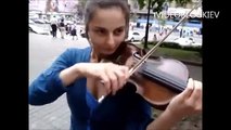 Playing violin, beautiful girl